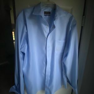 Never been worn Tasso Elba men’s dress shirt in blue.
